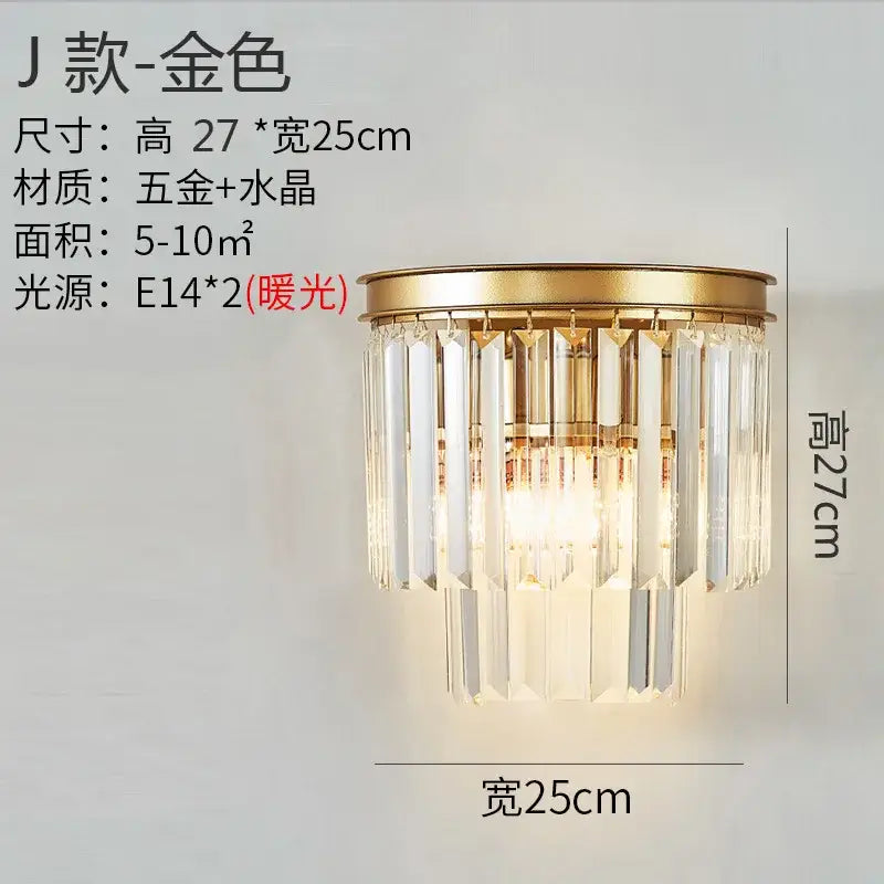 Modern gold brass crystal wall sconce with circular frame and cascading clear prisms for bedroom decorbites crystal modern lighting