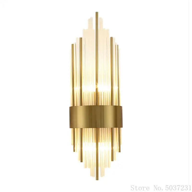 Gold-toned modern wall sconce with vertical glass rods and central brass band for bedroom decorbites crystal modern light