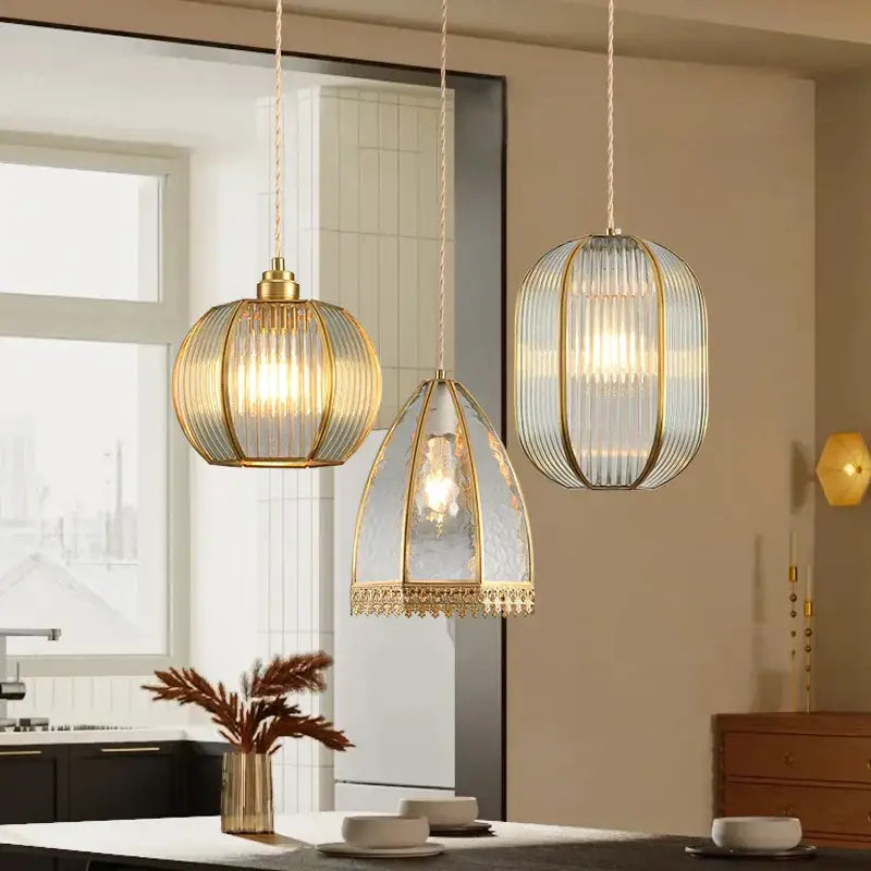 Three elegant modern gold brass glass restaurant light pendant fixtures with clear ribbed glass shades for decorbites brass glass decor