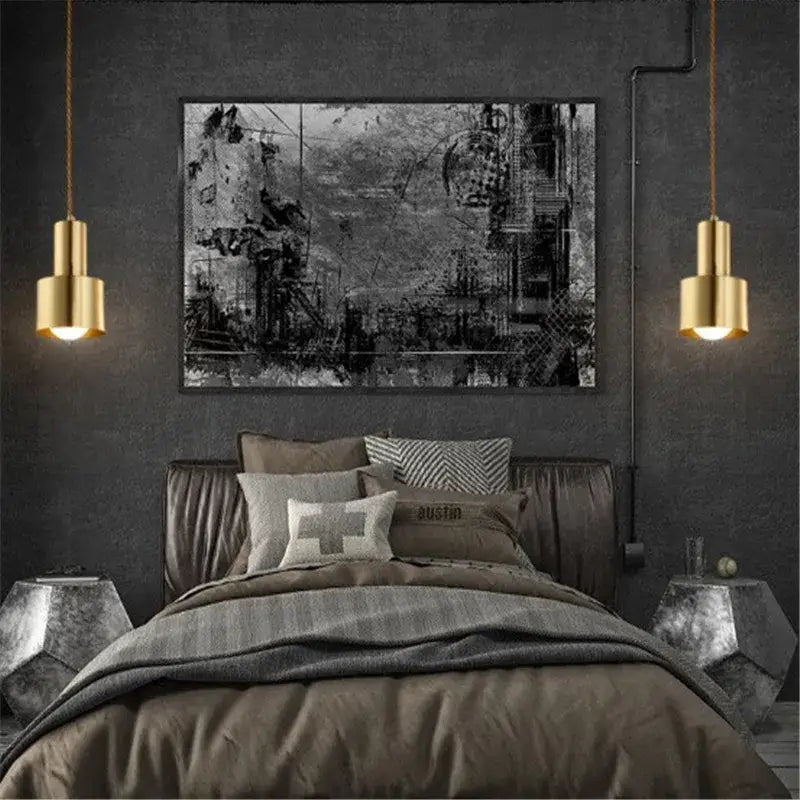 Black and white abstract cityscape canvas art with thin black frame complementing decorbites brass trumpet pendant light