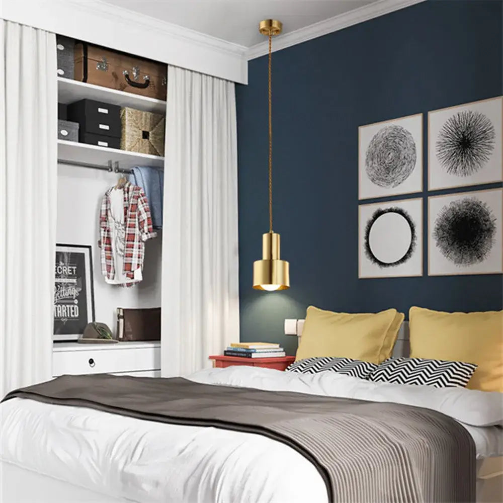 Modern gold brass trumpet pendant light with cylindrical shade and slender cord for bedroom decorbites brass trumpet decor