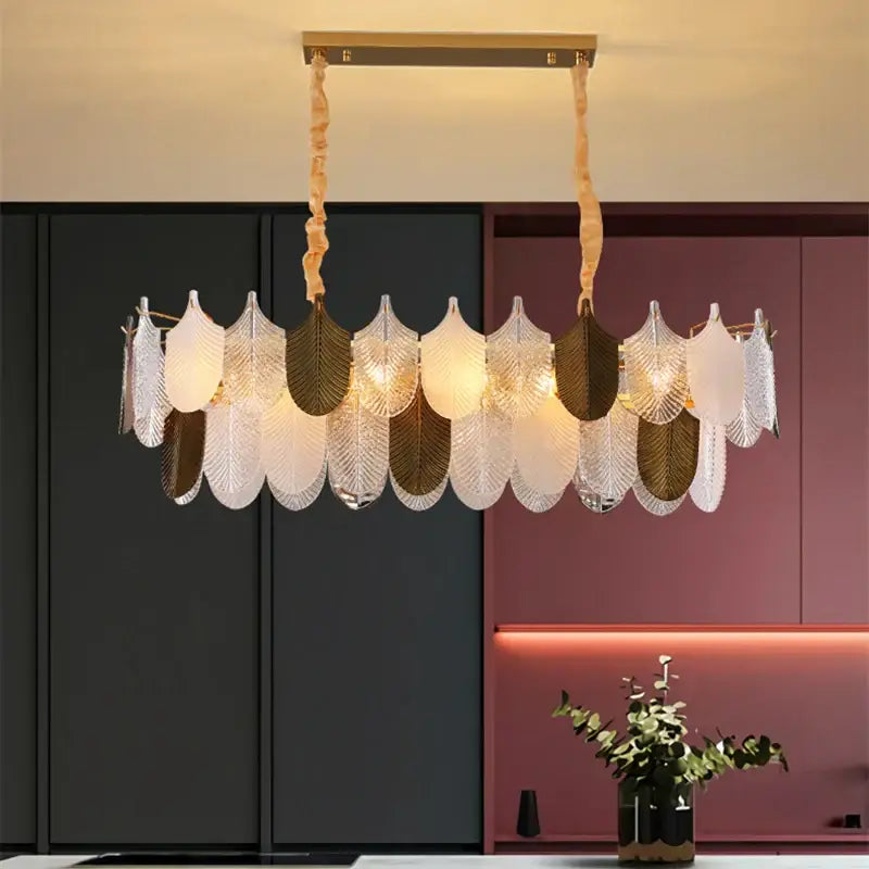 A modern gold and brown elegant glass ceiling chandelier with twisted fabric cords and leaf-shaped glass panels for decorbites elegant glass decor