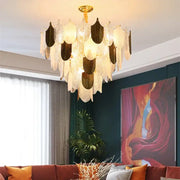 Modern gold and brown glass ceiling chandelier with layered leaf shaped glass and metal pieces for decorbites elegant glass decor