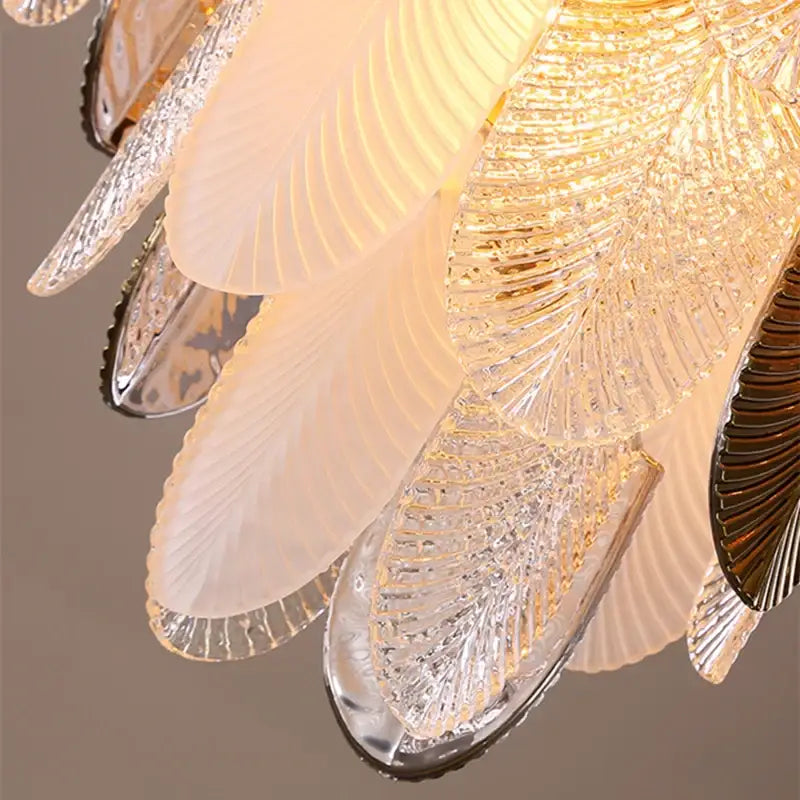 Modern gold and brown elegant glass ceiling chandelier with translucent feather-like shades for living room decorbites elegant glass