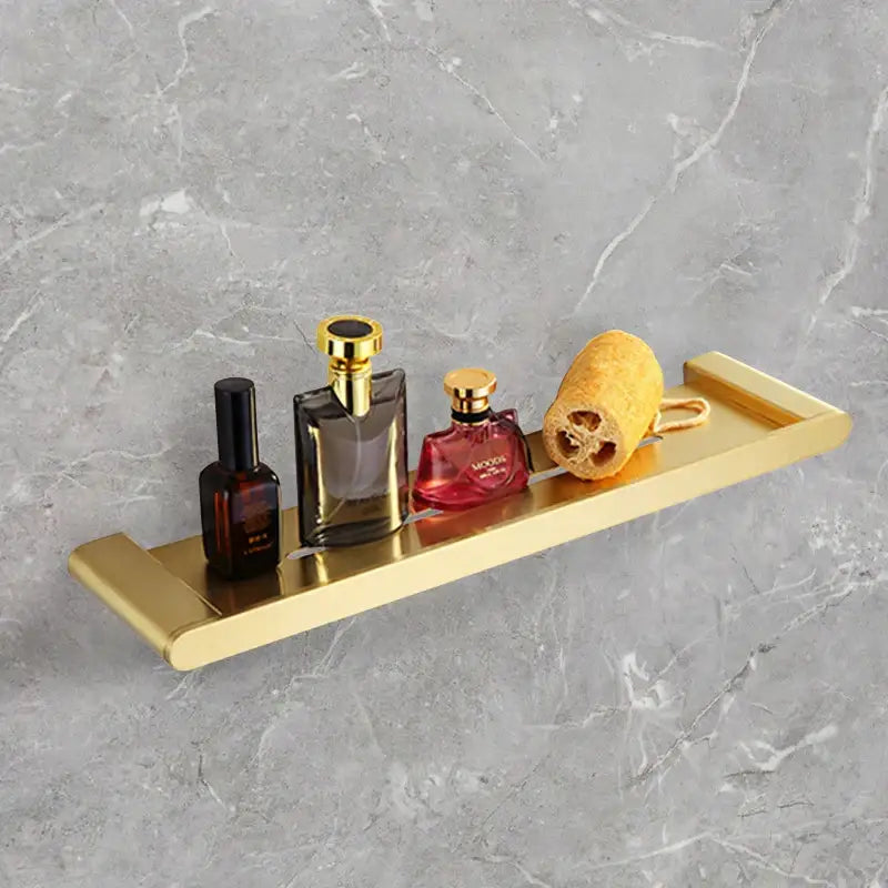 Modern gold brushed metal bathroom shelf with sleek design from decorbites bathroom accessories set for stylish bathroom decor