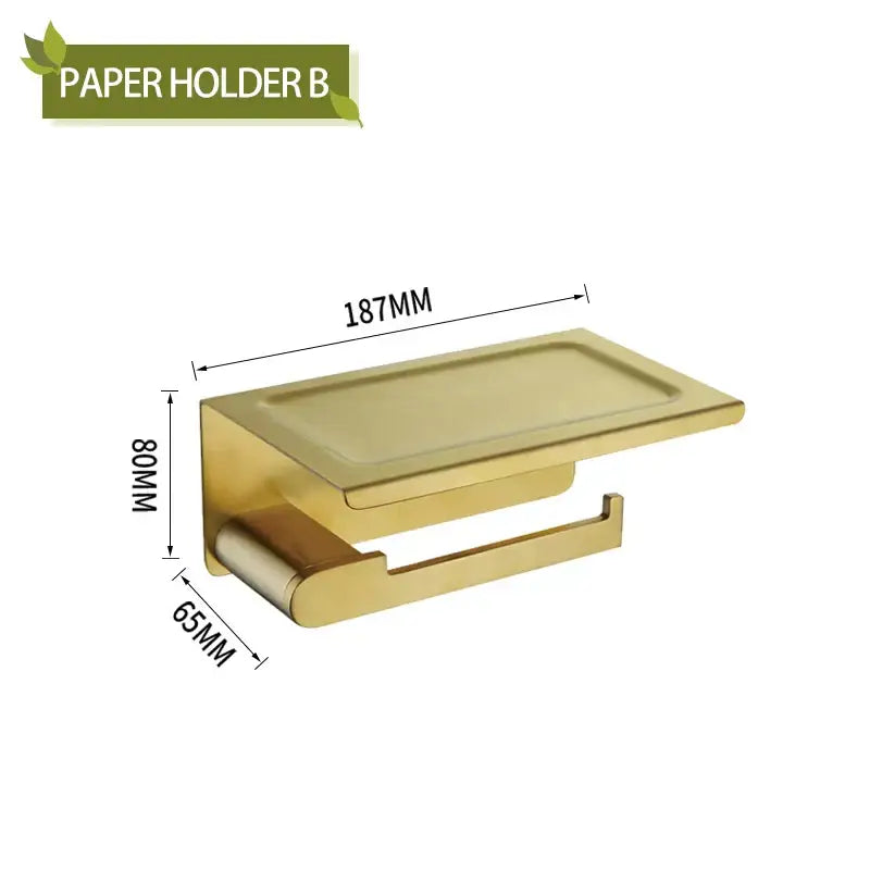 Modern gold brushed bathroom accessories set featuring a gold metallic paper holder with sleek integrated shelf decorbites bathroom accessories