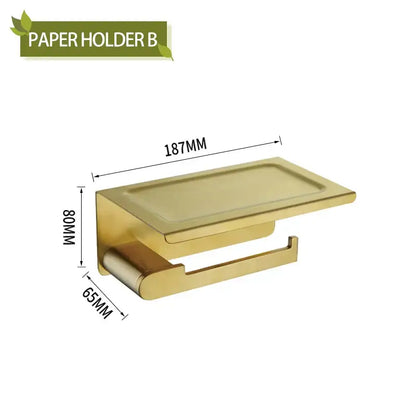 Modern gold brushed bathroom accessories set featuring a gold metallic paper holder with sleek integrated shelf decorbites bathroom accessories
