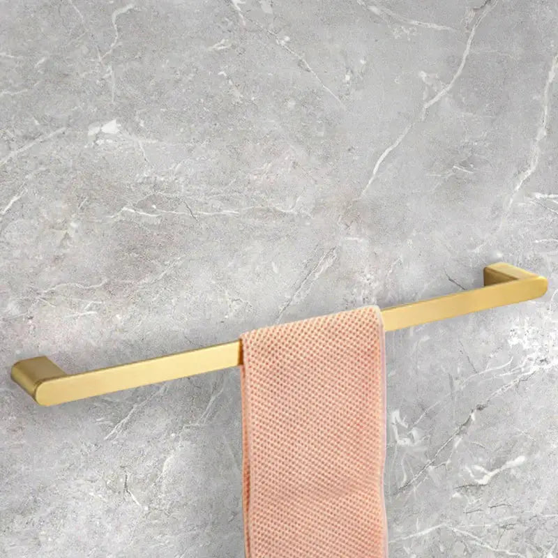 Modern gold brushed rectangular towel rack with sleek design in decorbites bathroom accessories set for bathroom decor
