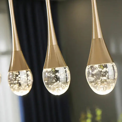 Modern gold bubble crystal chandelier pendant light with gold teardrop frames and clear glass globes filled with bubbles