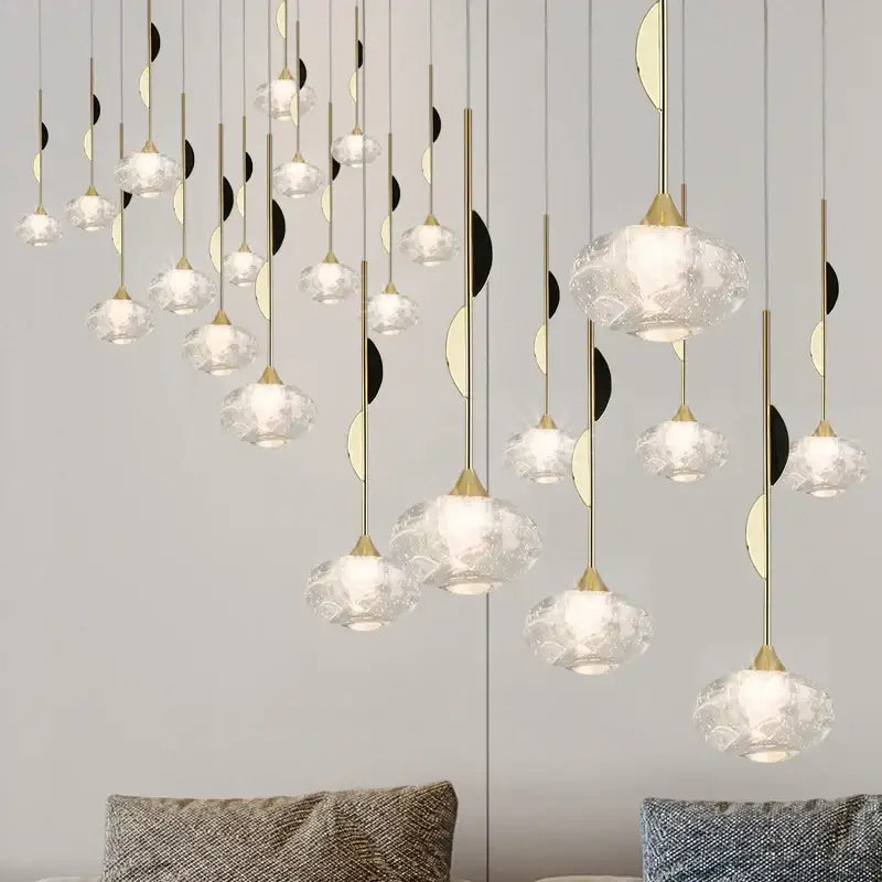 A modern gold bubble crystal pendant light with clear textured glass globes for dining room decorbites bubble crystal