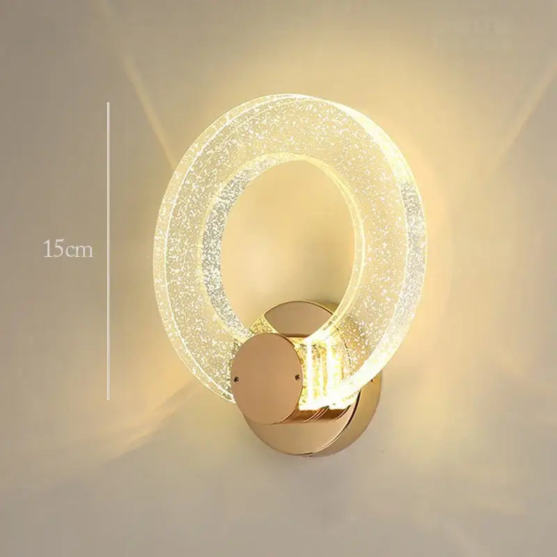 Modern gold bubble crystal pendant light with circular acrylic ring and metal base for living room lighting