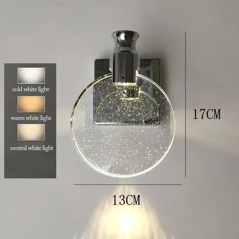 Modern gold bubble crystal pendant lights featuring a circular wall sconce with clear glass diffuser and chrome mount