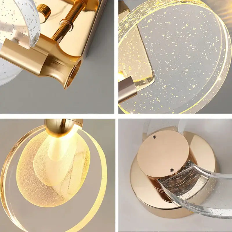 Modern gold bubble crystal pendant lights featuring gold-toned circular wall sconce with speckled glass shades