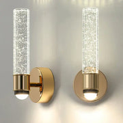 Modern gold bubble crystal wall sconces with clear cylindrical glass shades filled with sparkling bubbles for bedroom decorbites bubble crystal