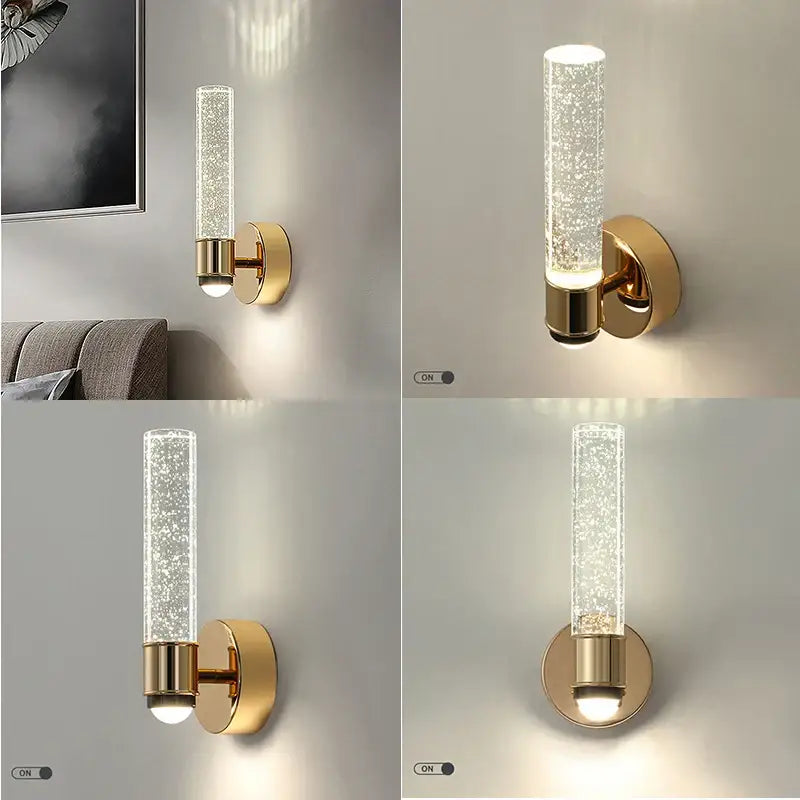 Modern gold bubble crystal wall sconces featuring a gold-toned cylindrical design with clear glass tube and frosted brass base