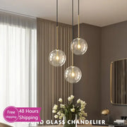 Modern gold bubble glass pendant light with clear spherical shades and gold-toned metal accents for kitchen decorbites bubble glass ball