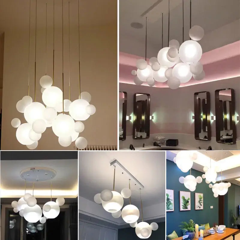 Modern gold bubble glass led chandelier featuring white spherical glass and gold-toned rods for kitchen decorbites bubble glass