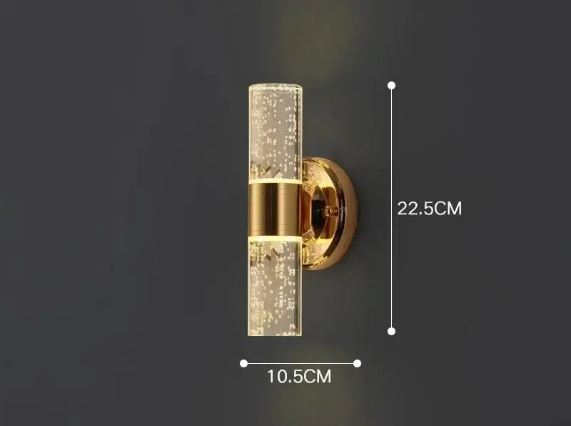 Modern gold bubble glass vanity lights featuring a gold-toned sconce with clear glass and two horizontal brass bands by decorbites gold vanity