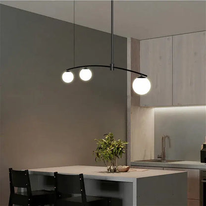 Modern black metal pendant light with three white glass bulbs from decorbites bubble iron chandelier collection