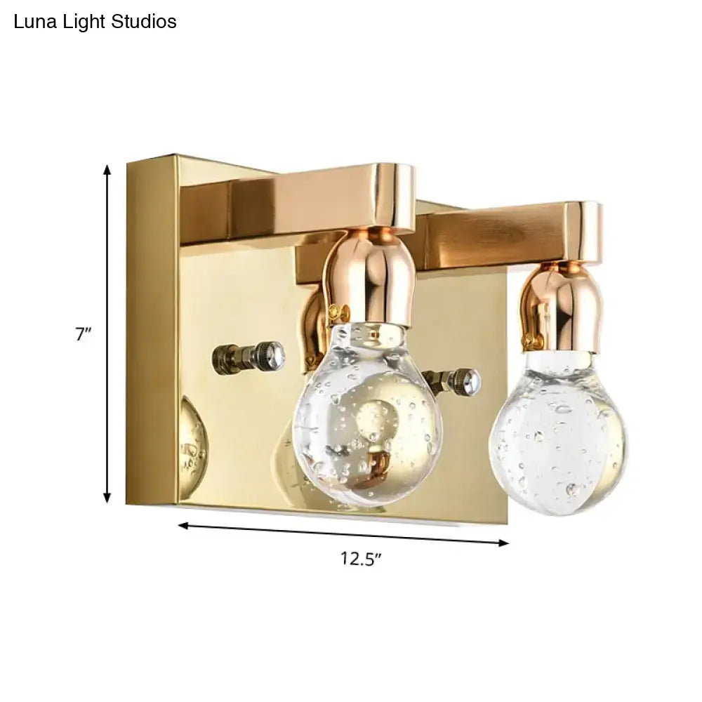 Modern gold bulb shaped crystal wall sconce with clear glass bubble bulbs and polished brass for 110v-120v bedrooms