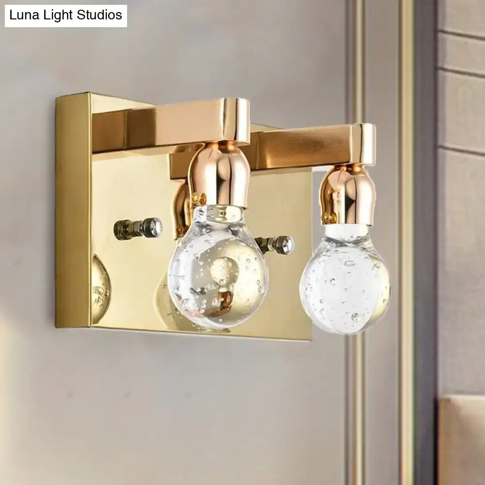 Modern gold bulb shaped crystal wall sconce with two clear bubble-filled glass globe shades for 110v-120v use