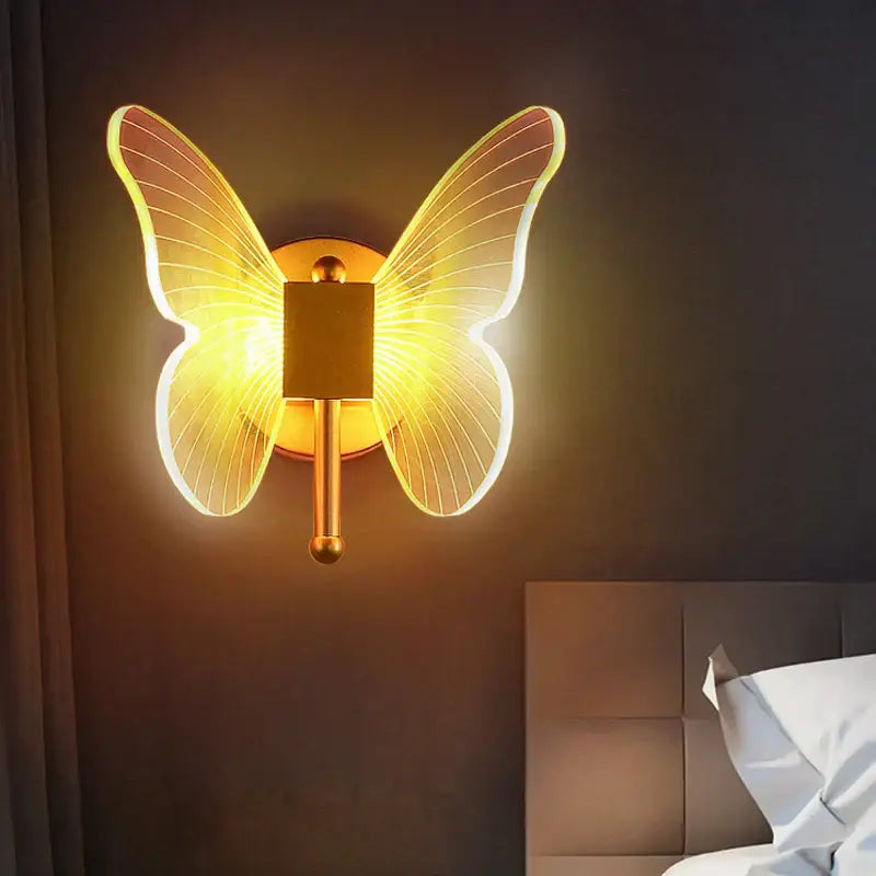 Modern gold butterfly acrylic led chandelier bedroom pendant light with illuminated translucent wings and sleek metallic base