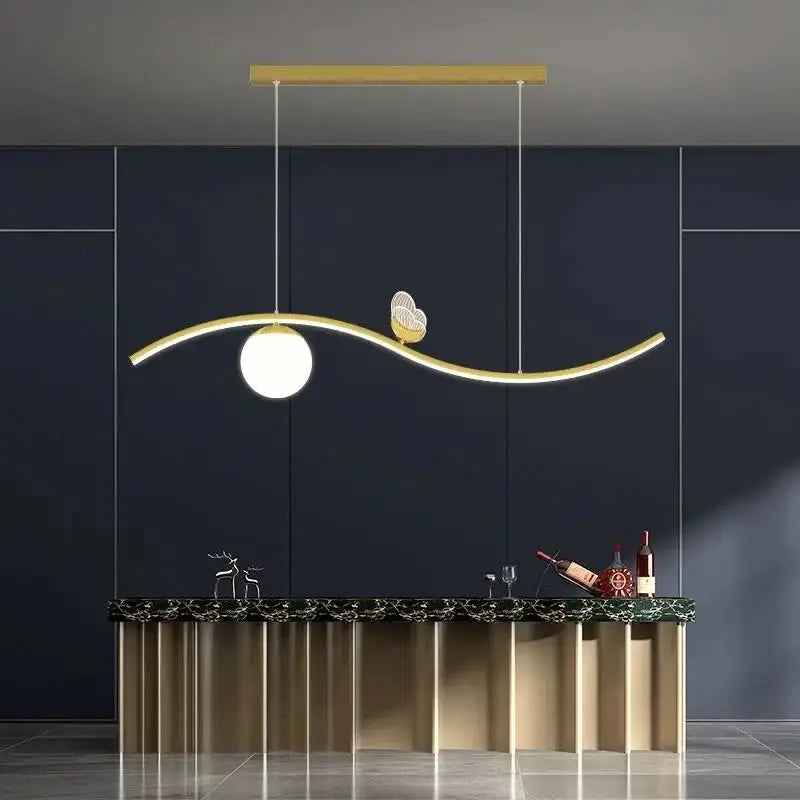 Modern gold butterfly chandelier pendant light with sleek curved design, integrated bulb, and decorative bird motif by decorbites butterfly chandelier