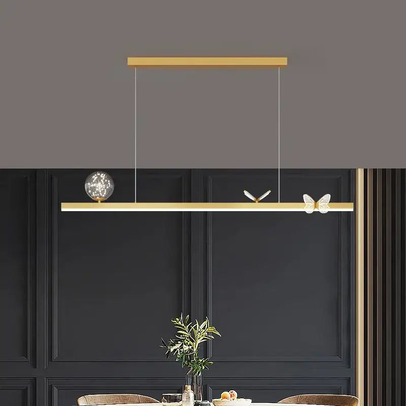 Modern gold butterfly chandelier linear pendant light with decorative spherical and butterfly accents for dining room decorbites butterfly chandelier