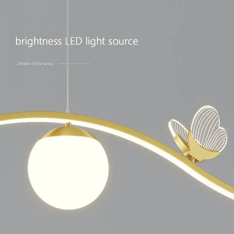 Modern gold butterfly chandelier pendant light with frosted glass shade and illuminated butterfly accent for dining room decorbites butterfly chandelier