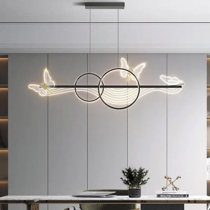 Modern black metal pendant lamp with glowing white butterfly and circular led accents decorbites butterfly chandelier