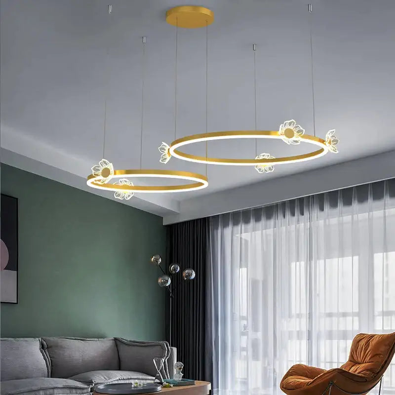 Modern gold butterfly crystal chandelier with gold circular pendant lights featuring delicate white floral cutouts for dining room decorbites butterfly crystal