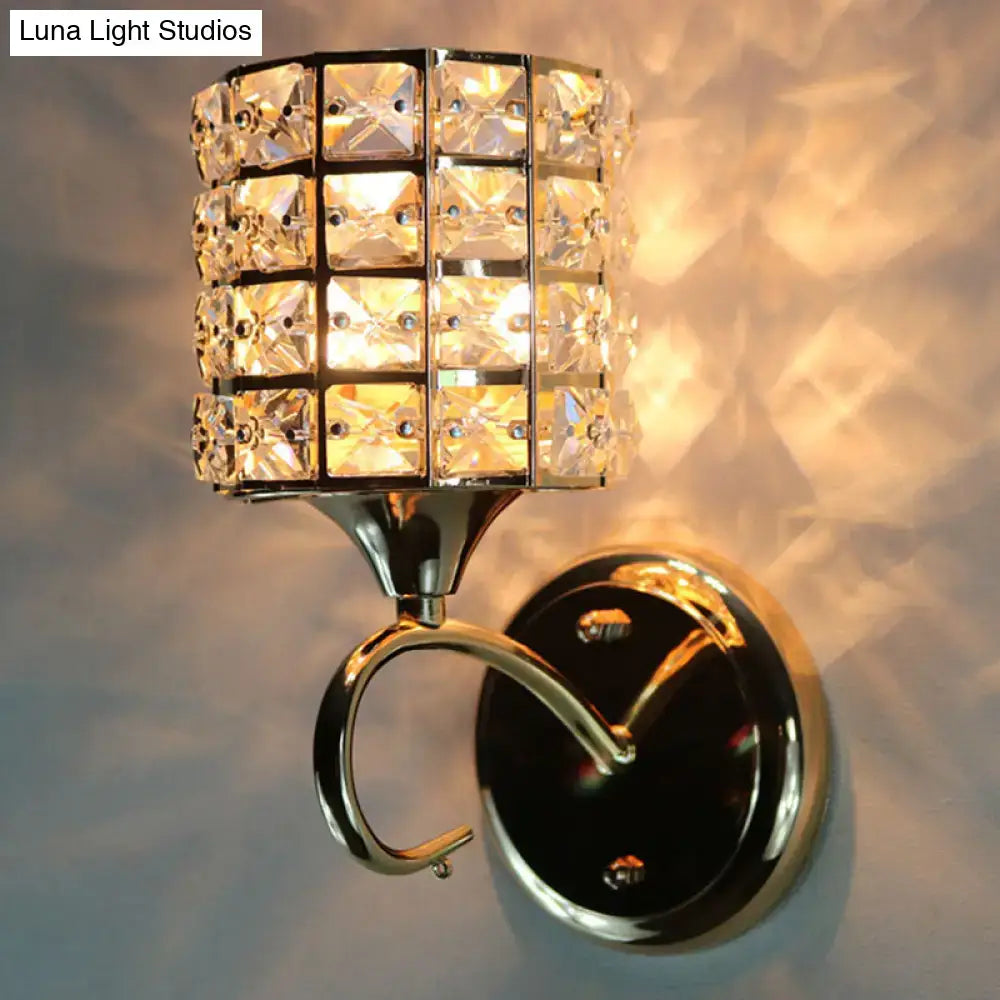Modern gold butterfly crystal wall light fixture with a faceted clear crystal shade and polished chrome wall light fixture