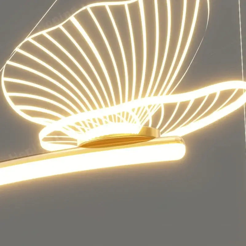 Modern gold butterfly design ceiling chandelier with glowing white neon lines and sleek horizontal bar base decorbites butterfly design