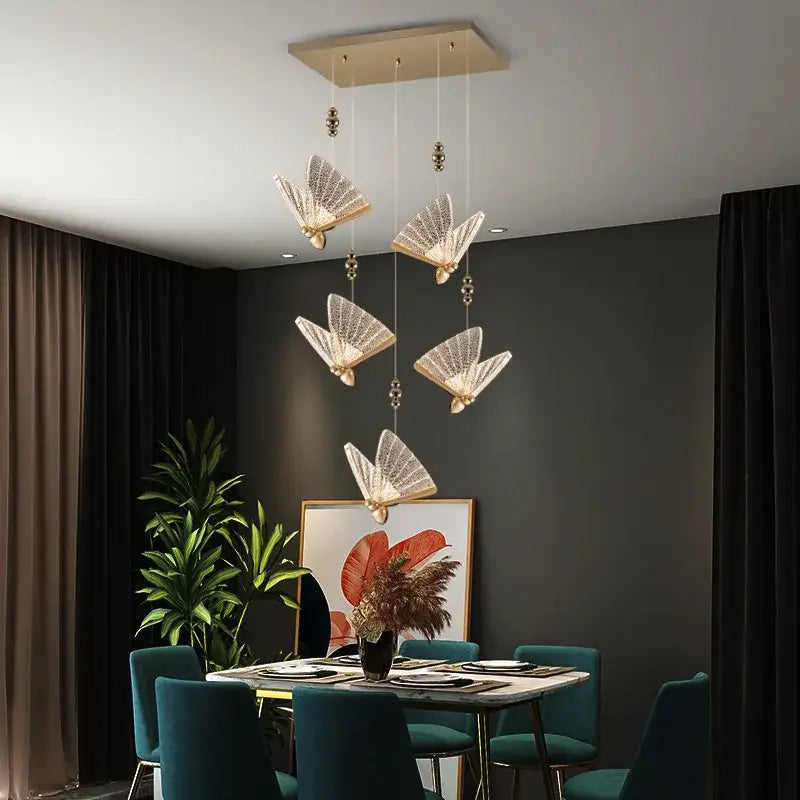Modern gold butterfly led chandelier with crystal embellishments from decorbites butterfly led pendant light collection