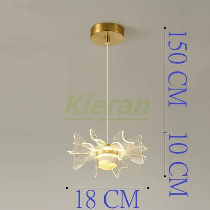 Modern gold butterfly led chandelier featuring a gold-finished fish-shaped pendant with frosted glass accents decorbites butterfly led