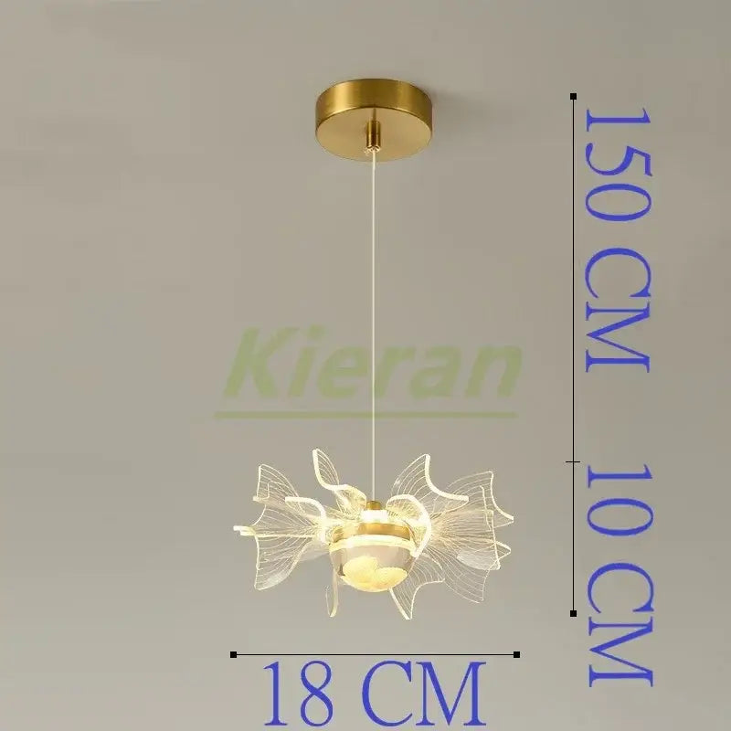 Modern gold butterfly led chandelier featuring a gold-finished fish-shaped pendant with frosted glass accents decorbites butterfly led