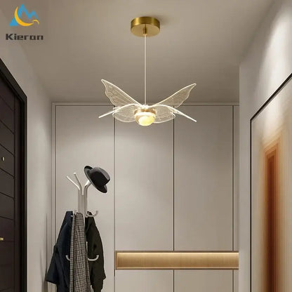 Modern gold butterfly led chandelier with translucent glass wings and central bulb for dining room decorbites butterfly led