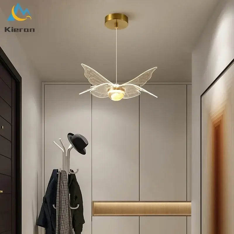 Modern gold butterfly led chandelier with translucent glass wings and central bulb for dining room decorbites butterfly led