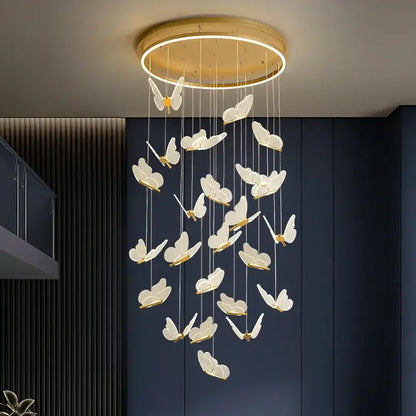 Modern gold butterfly led chandelier with translucent white wings and gold accents by decorbites for living room decor
