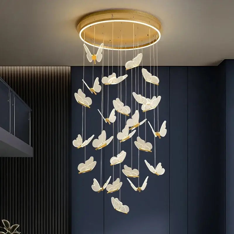 Modern gold butterfly led chandelier with translucent white wings and gold accents by decorbites for living room decor
