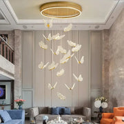 Modern gold butterfly led chandelier with multiple translucent white butterfly lights on a circular frame decorbites butterfly led
