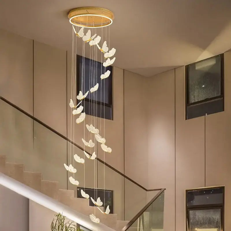Modern gold butterfly led chandelier with circular gold mount and translucent white butterfly lights decorbites butterfly led
