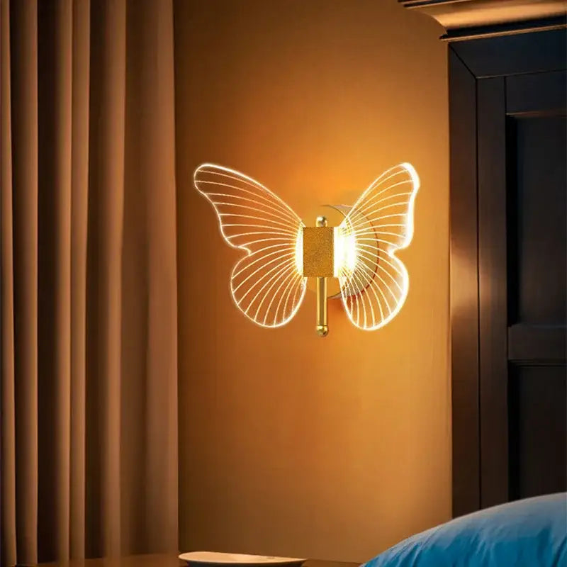 Modern gold butterfly nordic led wall lamp with illuminated wireframe wings for elegant bedroom decorbites butterfly nordic style
