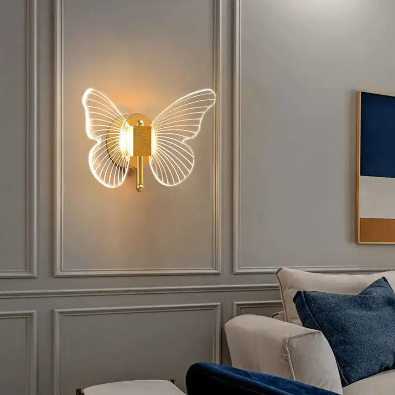Modern gold butterfly nordic led wall lamp with illuminated translucent wings for elegant bedroom decorbites butterfly nordic design