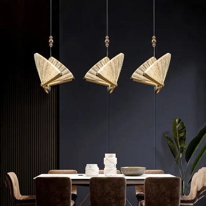 Three elegant modern gold butterfly pendant lamps with intricate woven mesh decorbites butterfly pendant lighting fixtures