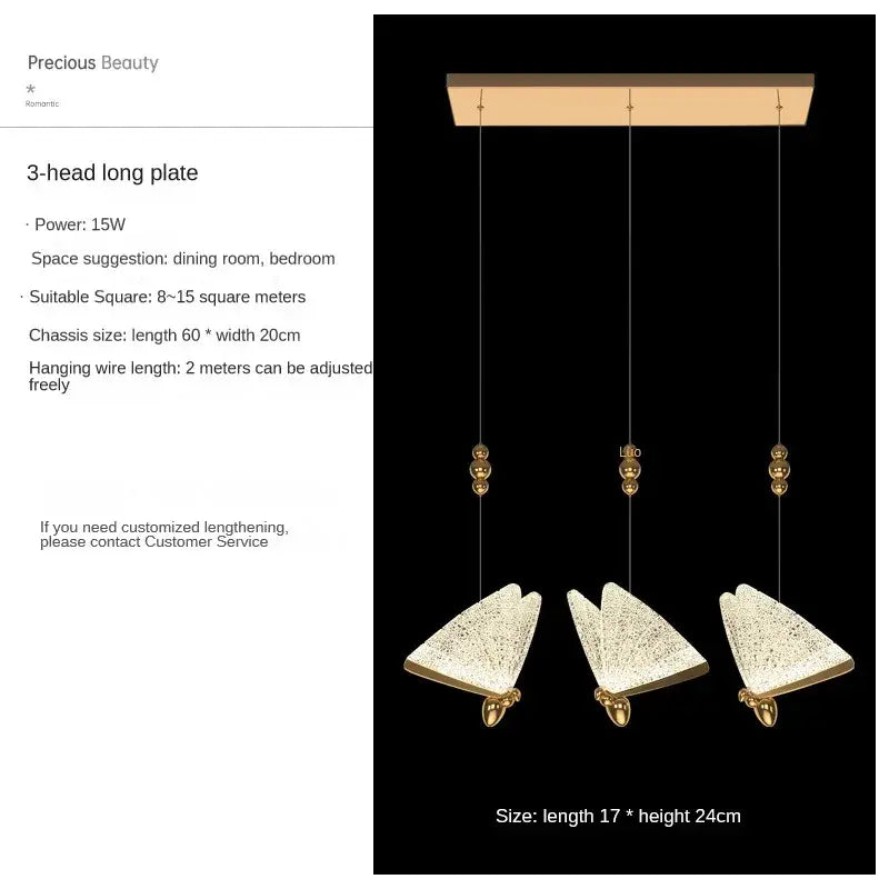 Modern gold butterfly pendant lamps featuring gold-toned three-head pendant lamps with textured triangular glass shades