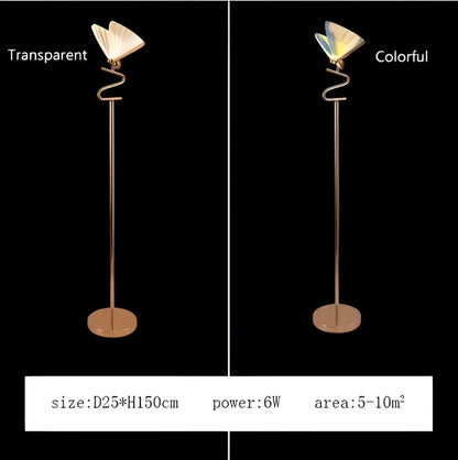 A slender gold-toned metal floor lamp with a curved stand and butterfly pendant lamps for modern bedroom decorbites lighting