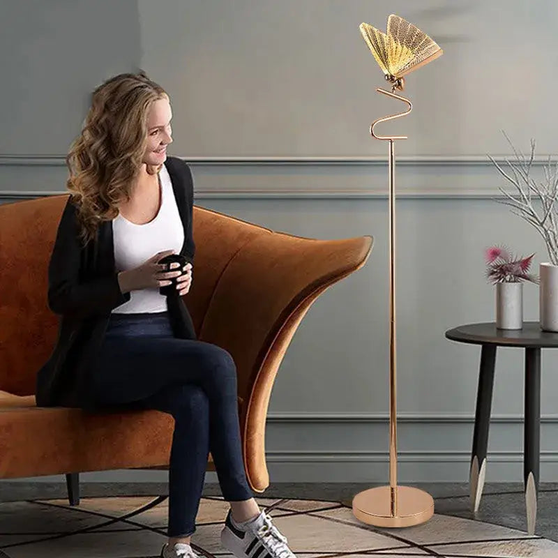 Modern gold butterfly pendant lamp with intricate wing detailing and slender curved stem for luxury bedroom lighting decorbites butterfly pendant lamps