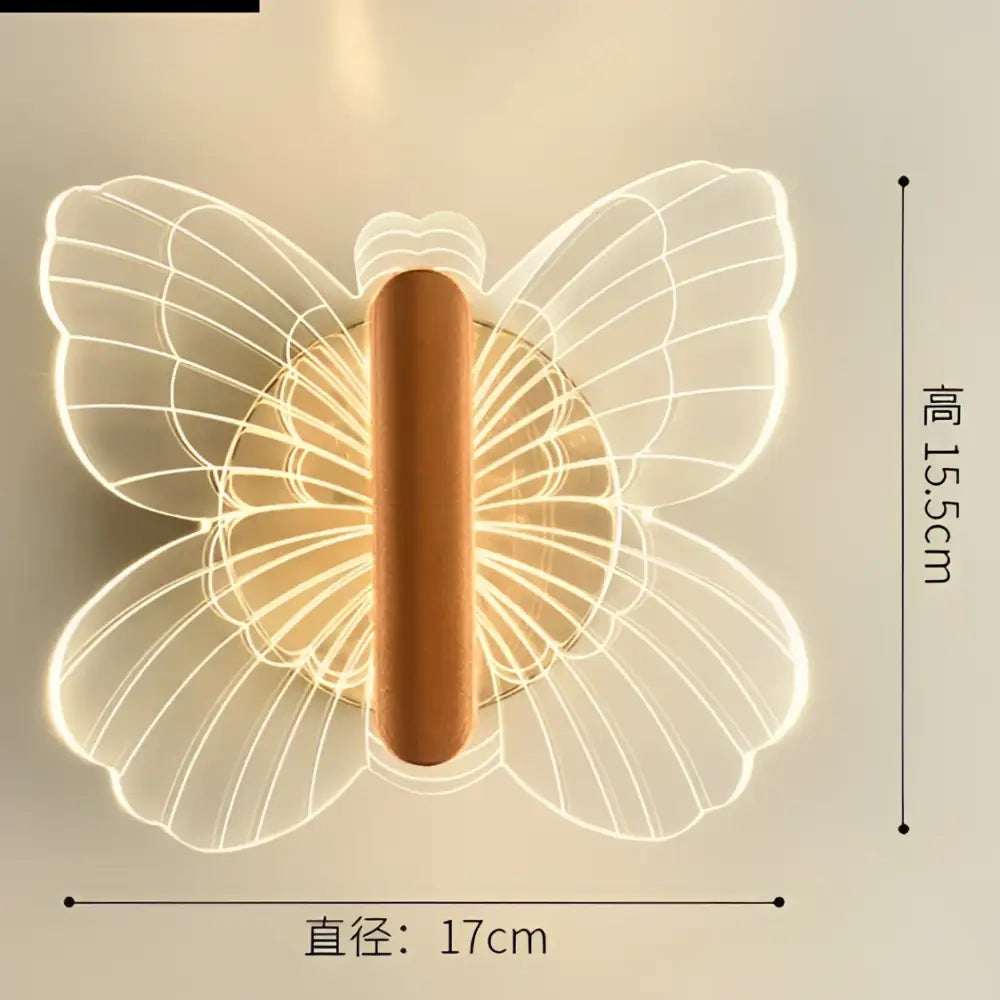 Modern gold butterfly wall lamp with translucent wings and warm wooden handle ideal for bedroom decorbites butterfly wall lamp