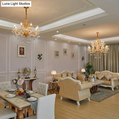 Lámpara de araña moderna dorada con candelabro y detalles de cristal - 8 cabezales colgantes de metal